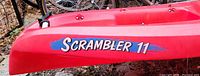 Close view of starboard bow showing "Scrambler 11" decal