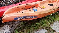 Port side view showing Scrambler XL decal and bow bungee rigging