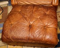 Top view of tufted leather cushion