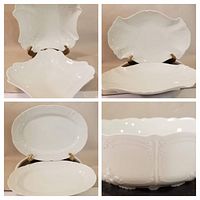 Group of white Baronesse serving pieces showing various shapes