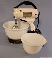 Front view of mixer on stand with both bowls
