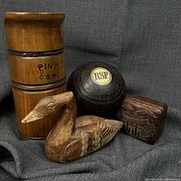 Group shot showing mug, lawn bowl, bird and box