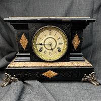 Front view of Seth Thomas faux marble mantel clock
