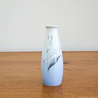 Full view of vase front showing motif and shape