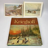 Front cover of book with two art cards