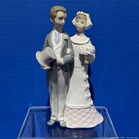 Full front view of Lladro bride and groom porcelain figurine