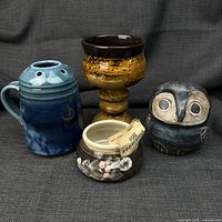 Group shot showing all four pottery items