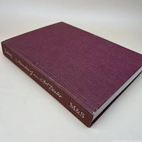 Front and spine of maroon cloth hardcover book