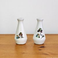 Front view of both Denby Shamrock shakers