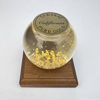 Top view showing 24 Karat Pure Gold California label on globe