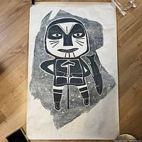 Full view of Spear Fisher reproduction print on floor held flat by clips