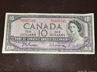 Obverse of 1954 Canadian $10 note showing serial number and portrait