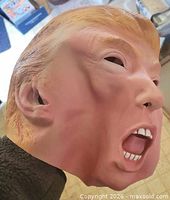 Side view of Donald Trump latex mask showing facial features