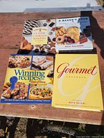 Front covers of four cookbooks