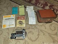 Camera, case and manuals overview