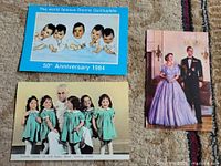 Fronts of the three postcards showing designs