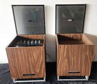 Both Wynford Hall cabinets front view with lids open