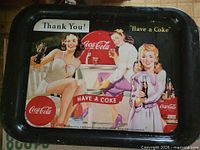 Front of Coca-Cola tray showing graphic