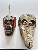 Both masks side by side on flat surface