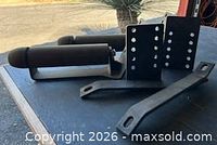 Full lot view showing bumpers, perforated plates, and straps