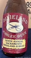 Front label close-up showing Dixieland Jubilee Beer branding and event details