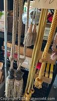 overall view of several tie backs hanging