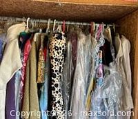 Closet rod with multiple garments, variety of colors and styles