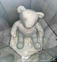 front view teddy bear in mirrored environment showing patchwork details