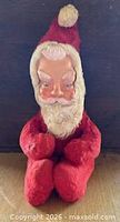 Front view of vintage plush Santa showing full body