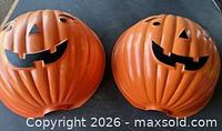Both pumpkin light covers side by side showing general condition