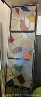 Full view of the tall stained glass window
