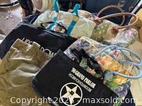 Group shot of all tote bags showing designs and colors