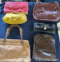 Group shot of all six handbags and clutches