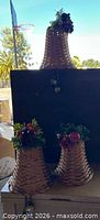 All three wicker bells showing size relation and decorations