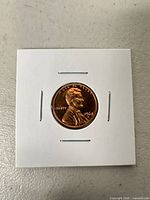 Obverse view of 1968-S proof cent in cardboard flip