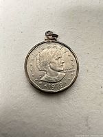 Obverse of 1979 Susan B. Anthony dollar coin pendant