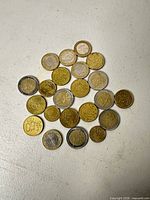 Overview of mixed Euro coins spread on surface