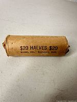Front of sealed coin roll showing $20 HALVES $20 and Bowsar Inc. printing