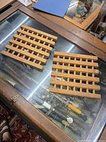 Both wooden lattice stands side by side showing overall appearance