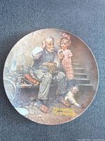 Full view of Norman Rockwell "The Cobbler" collector plate front
