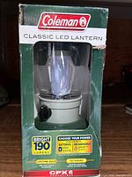 Front of boxed Coleman Classic LED Lantern showing branding and 190 lumens rating