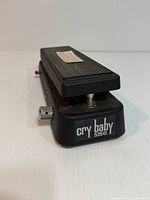 Front angled view of Dunlop Cry Baby 535Q pedal showing logo and tread surface