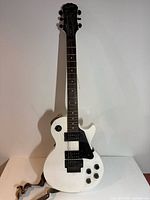 Front view displaying body, pickups, controls, and pickguard