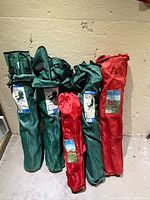 Six folding camp chairs in carry bags, showing colors and labels