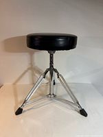 Front view of Stagg drum throne showing seat, chrome double-braced legs and rubber feet
