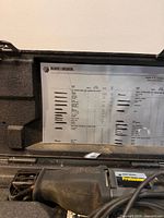 Saw, cord, case interior with foam and accessories