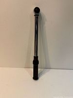 Full view of entire torque wrench upright