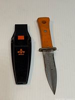 Knife and sheath side-by-side showing overall design