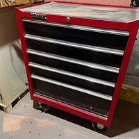 Front view of red Homak five-drawer rolling toolbox