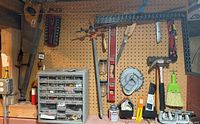 Overall pegboard view with tools and organizer